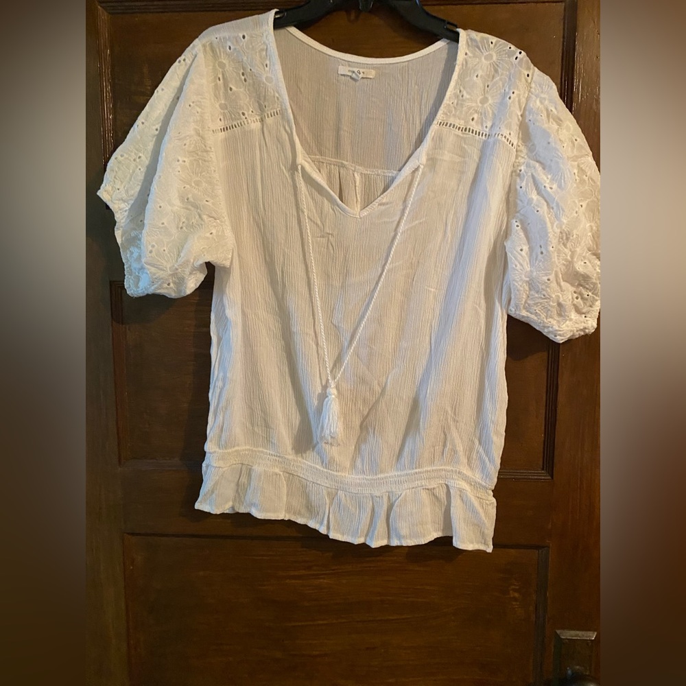 Maurice’s light, white top with puffy sleeves